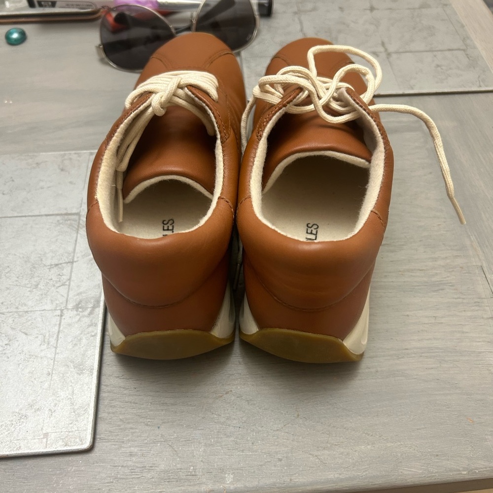 Tan sneaker type shoes! Never worn